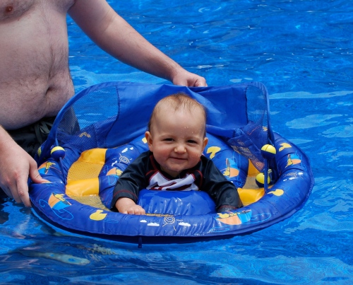 Owen LOVES to splash in the water.