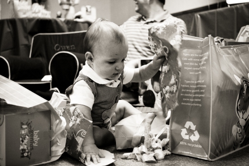 Owen's favorite part of presents...the wrapping paper, of course!